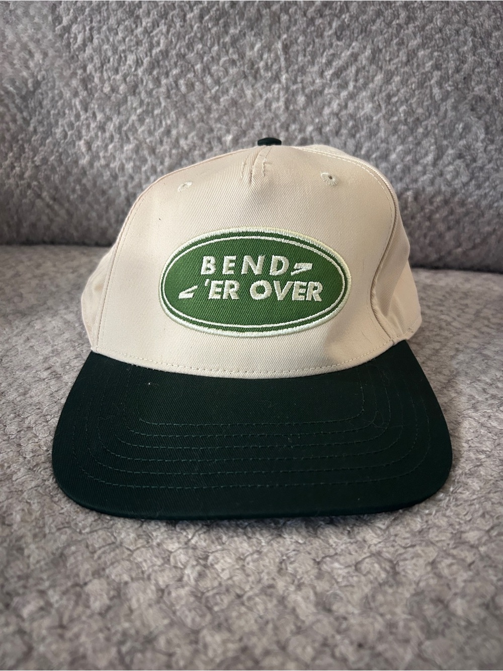 Visibly Toxic Cream Snapback Hat with Dark Green Bill